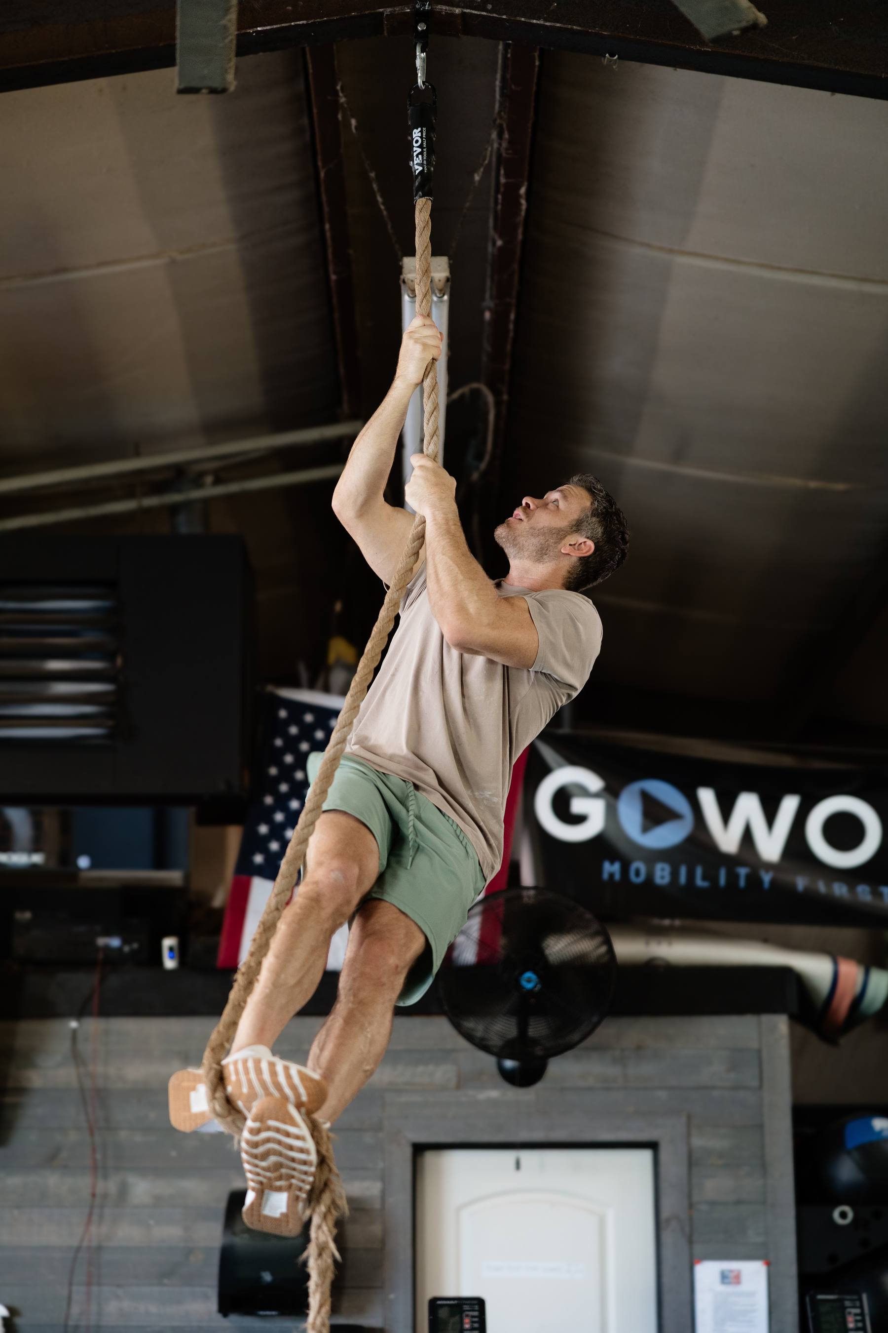 Dr. Dustin Bergeron climbing the rope